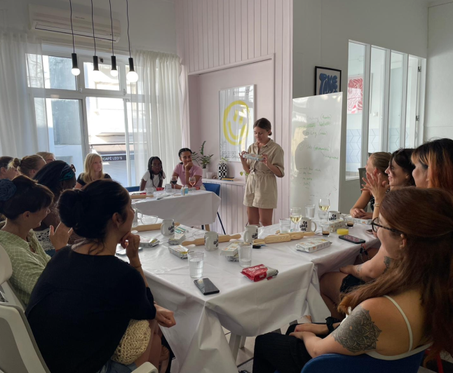 Girl hosting a workshop Full venue rental in Albufeira coworking space